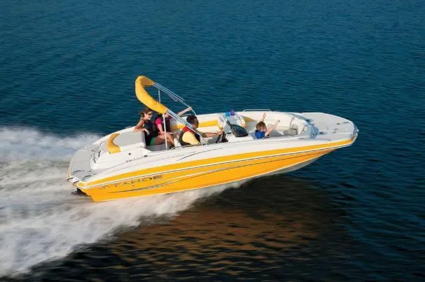 Slide: The Image of 2012 Tahoe 195 boat cruising on open water with passengers enjoying the ride. - 5