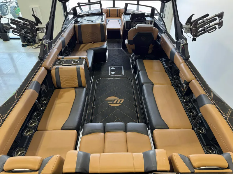 Slide: The Image of 2023 Malibu Wakesetter 26 LSV interior with luxurious seating and modern design. - 11