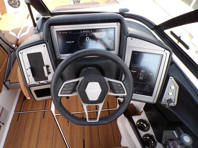 Slide: The Image of 2023 Supra SL 450 dashboard with modern steering wheel and digital displays. - 13