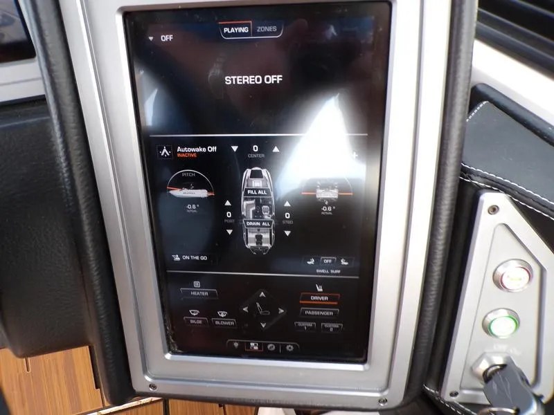 Slide: The Image of 2023 Supra SL 450 dashboard display showing stereo and control settings. - 14