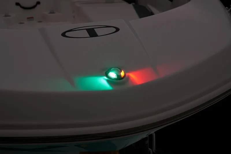 Slide: The Image of 2020 Tracker TAHOE T16 boat with illuminated navigation lights at night. - 10