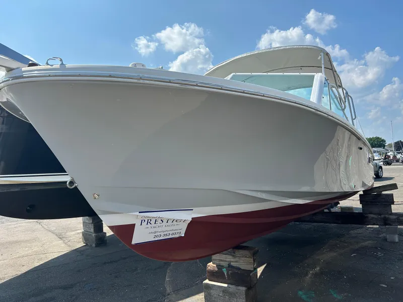 Slide: The Image of 2016 Hunt Yachts Harrier 25 on display, showcasing sleek design and craftsmanship. - 1