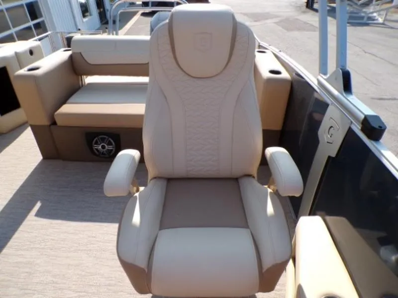 Slide: The Image of Luxurious seating on 2025 Godfrey Monaco 255 DFL pontoon boat, featuring premium upholstery. - 13