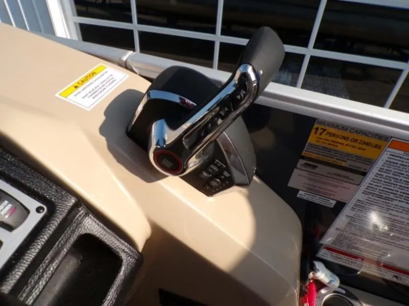 Slide: The Image of Control lever of 2025 Godfrey Monaco 255 DFL boat, featuring iMPACT Center Tube Package. - 16