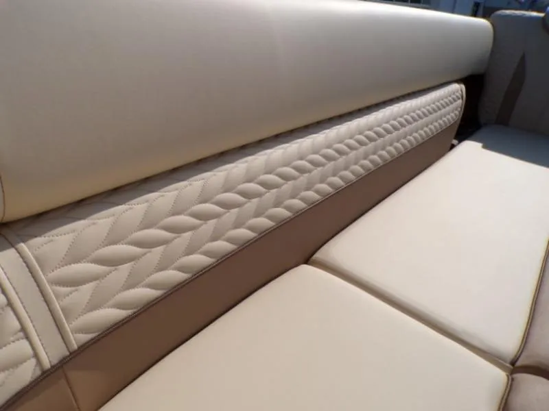 Slide: The Image of Luxurious beige seating on 2025 Godfrey Monaco 255 DFL boat, featuring elegant quilted design. - 23