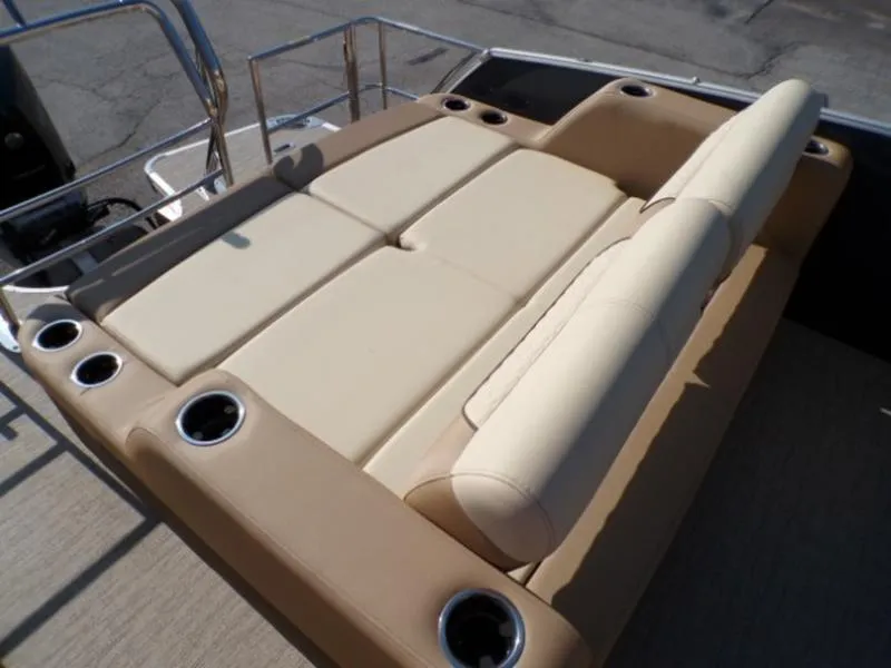 Slide: The Image of Luxurious seating on 2025 Godfrey Monaco 255 DFL boat with cup holders. - 7