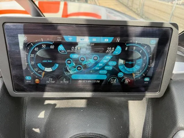 Slide: The Image of Dashboard display of a 2019 Malibu Wakesetter 22 MXZ boat showing speed and navigation data. - 14