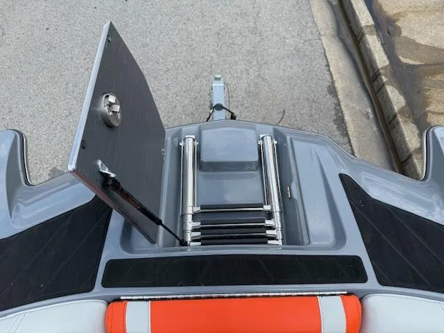 Slide: The Image of 2019 Malibu Wakesetter 22 MXZ swim platform with foldable ladder and storage compartment. - 5