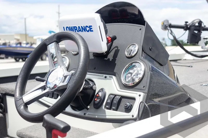Slide: The Image of 2019 Ranger RT188 boat dashboard with steering wheel and Lowrance fish finder. - 14