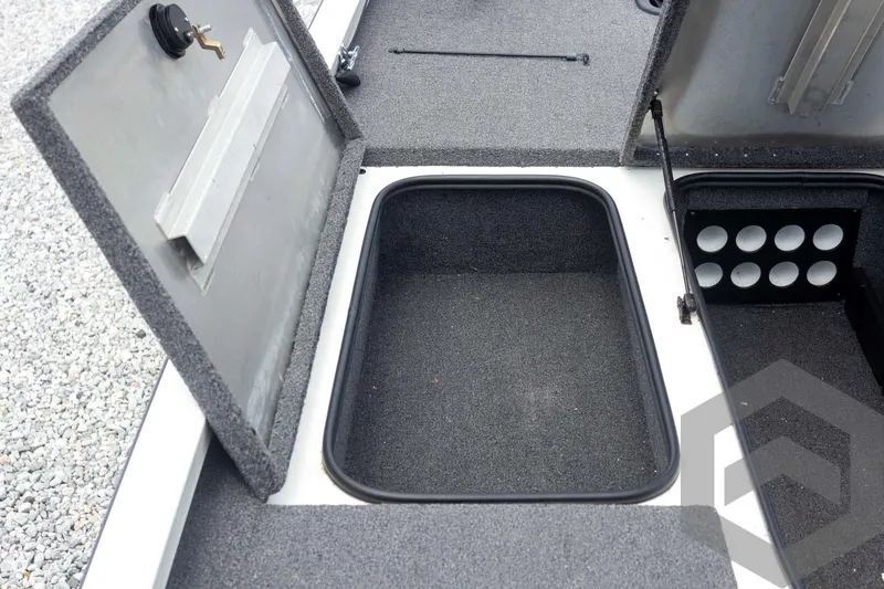 Slide: The Image of 2019 Ranger RT188 boat storage compartment with open hatches, showcasing interior space. - 21