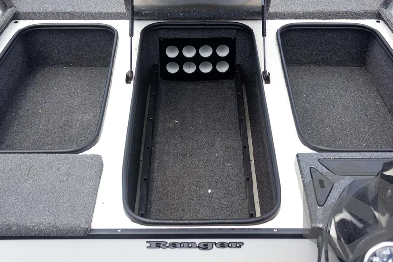 Slide: The Image of 2019 Ranger RT188 boat storage compartments with rod holders. - 22
