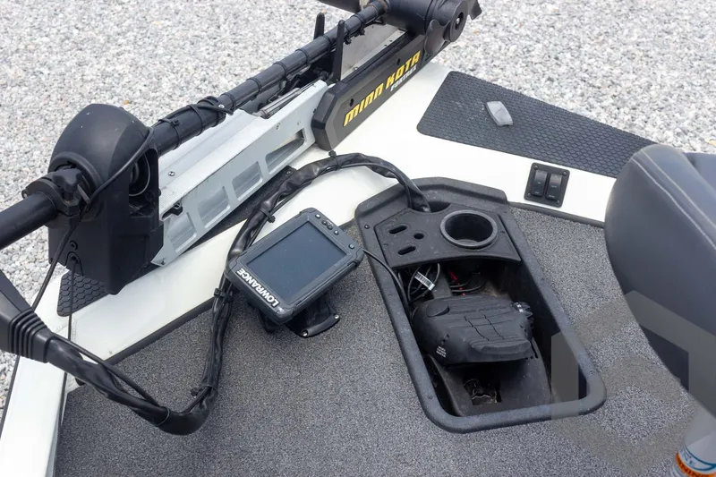 Slide: The Image of 2019 Ranger RT188 boat deck with electronics and storage compartment. - 24