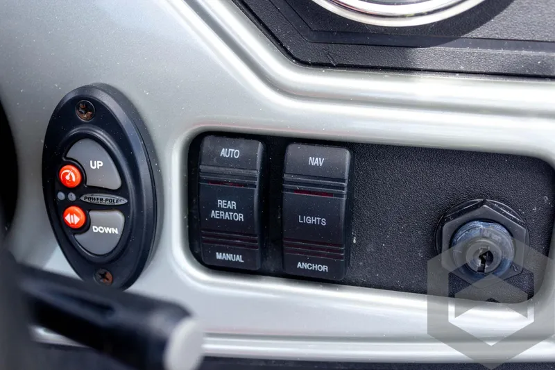 Slide: The Image of Control panel of a 2019 Ranger RT188 boat with various switches and buttons. - 29