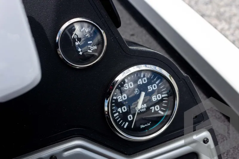 Slide: The Image of Dashboard of 2019 Ranger RT188 boat with speedometer and fuel gauge. - 30
