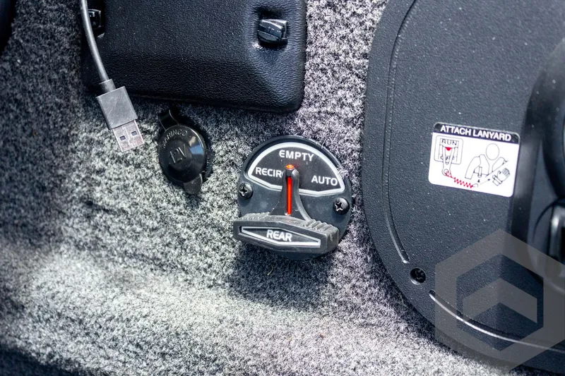 Slide: The Image of Control panel of a 2019 Ranger RT188 boat with USB port and lanyard attachment. - 31