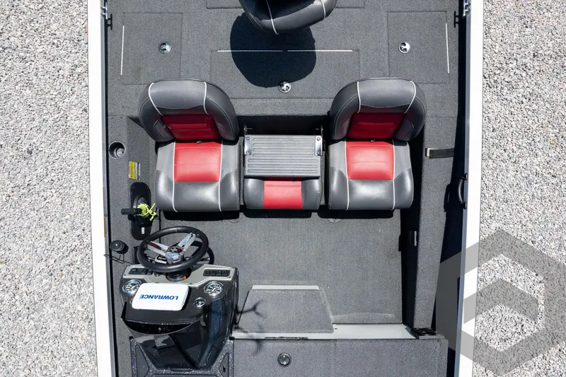 Slide: The Image of 2019 Ranger RT188 boat interior with red and black seats, steering console, and carpeted floor. - 39