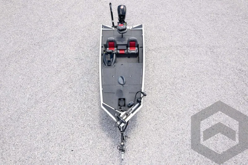 Slide: The Image of 2019 Ranger RT188 fishing boat, aerial view, featuring dual seats and motor on a textured surface. - 41