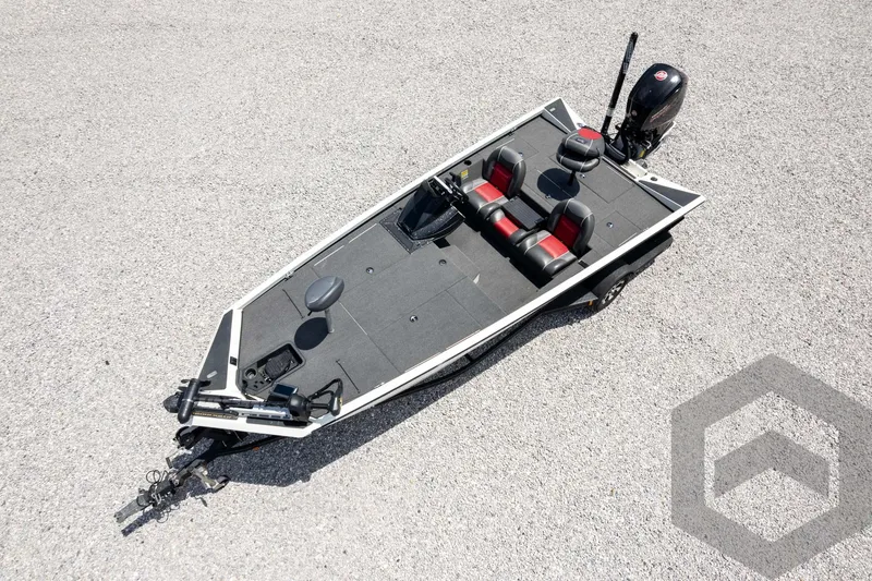 Slide: The Image of 2019 Ranger RT188 fishing boat with dual seats and motor, viewed from above on gravel. - 48
