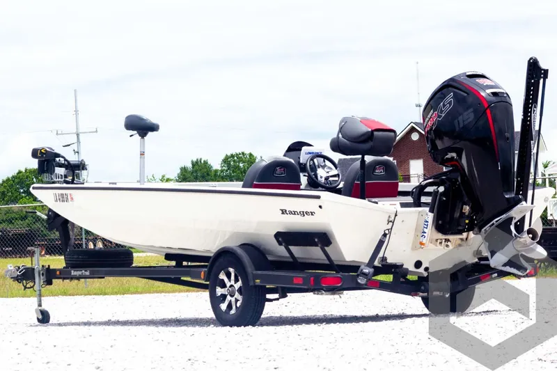 Slide: The Image of 2019 Ranger RT188 boat on trailer, featuring sleek design and powerful outboard motor. - 7