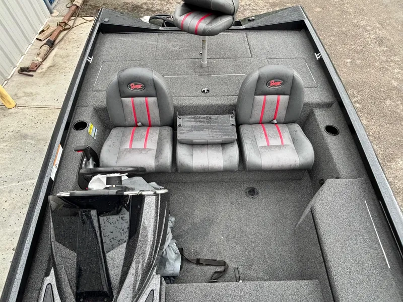 Slide: The Image of 2016 Ranger RT178 boat interior with gray and red seats, spacious layout. - 7