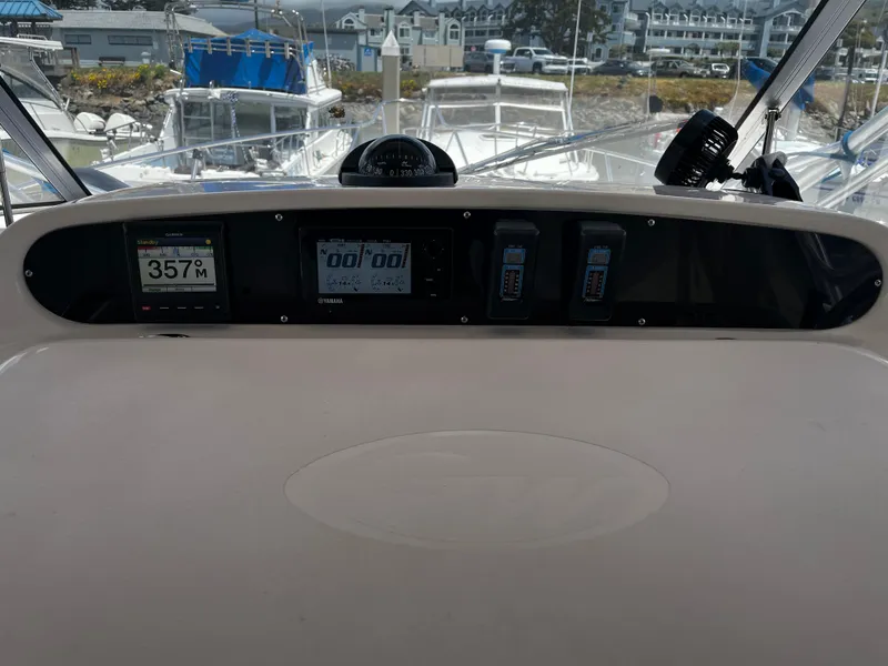 Slide: The Image of Dashboard of a 2003 Grady-White 33 Express boat with navigation instruments. - 3