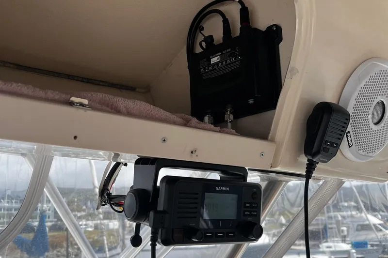 Slide: The Image of 2003 Grady-White 33 Express boat interior with Garmin radio and speaker system. - 7