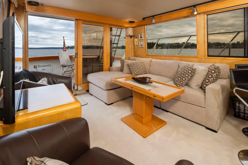 Slide: The Image of Luxurious interior of 1989 Ocean Alexander 50 Sedan yacht with comfortable seating and scenic views. - 10