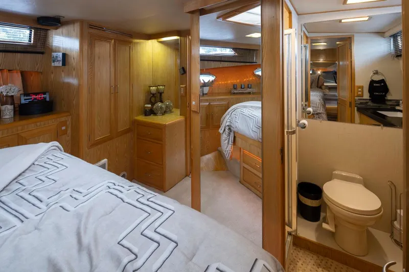 Slide: The Image of Interior of 1989 Ocean Alexander 50 Sedan yacht with cozy bedroom and bathroom. - 20