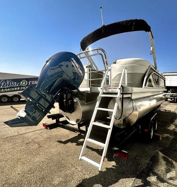 Slide: The Image of 2025 Godfrey SWEETWATER 2286 SB pontoon boat with outboard motor and trailer. - 11