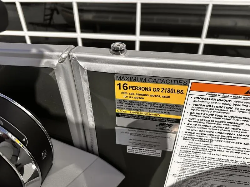 Slide: The Image of Capacity label on 2025 Godfrey SWEETWATER 2286 SB iMPACT, showing 16-person or 2180 lbs limit. - 14