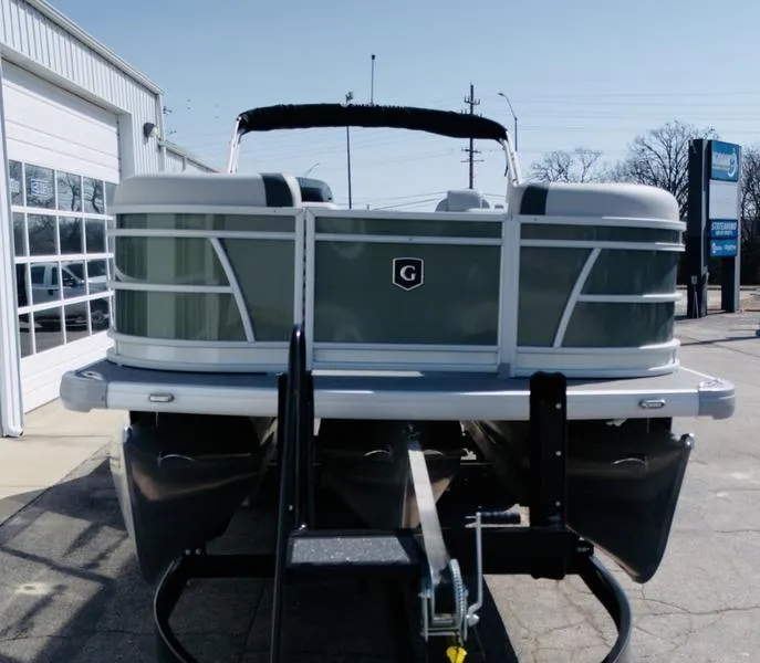 Slide: The Image of 2025 Godfrey SWEETWATER 2286 SB iMPACT pontoon boat on trailer, front view. - 3