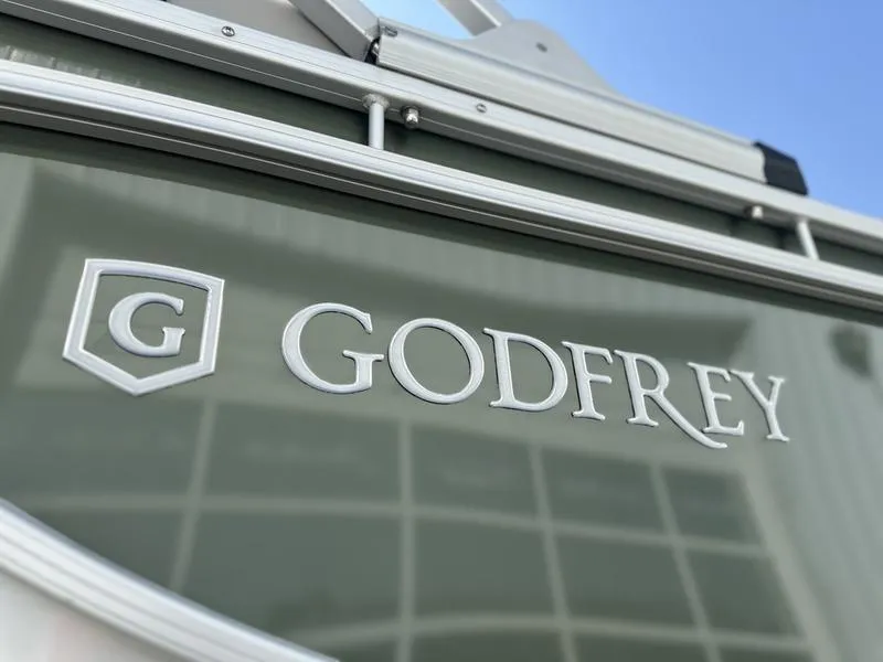 Slide: The Image of Close-up of 2025 Godfrey SWEETWATER 2286 SB iMPACT Package logo on boat exterior. - 6