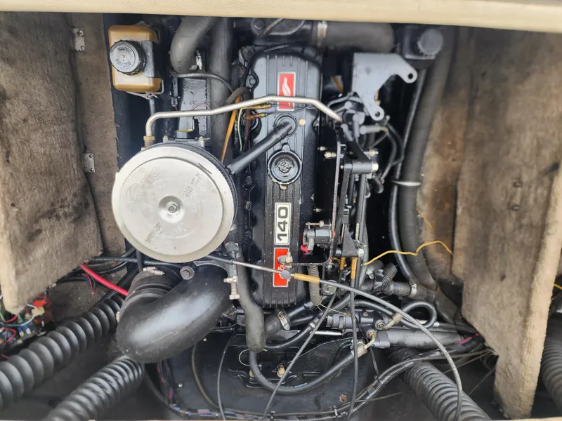 Slide: The Image of Engine of 2003 Mariah Bow Rider SX9 boat, showcasing mechanical components and wiring. - 14