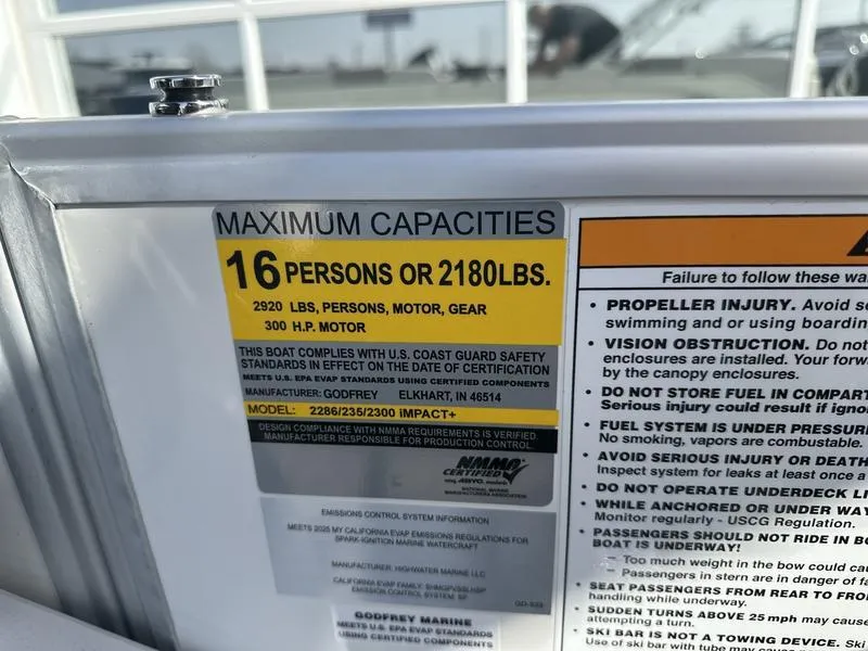 Slide: The Image of Capacity label on 2025 Godfrey Sweetwater 2286 SB boat, max 16 persons or 2180 lbs. - 10