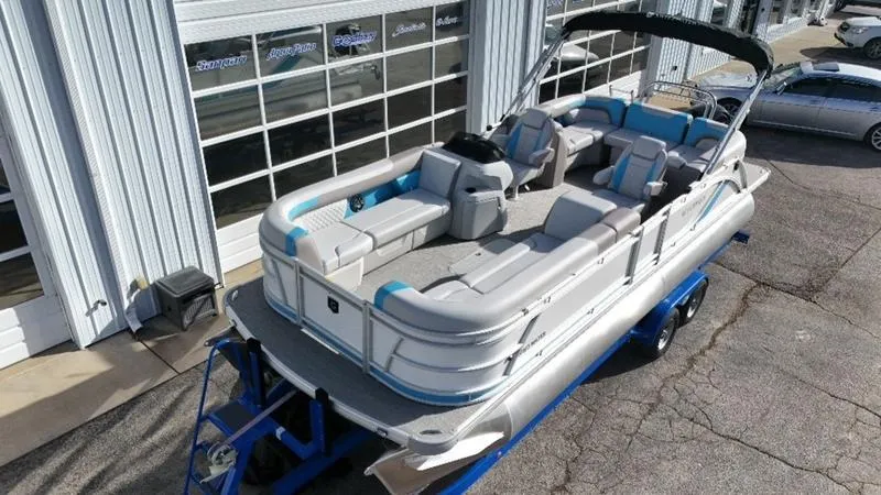 Slide: The Image of 2025 Godfrey Sweetwater 2286 SB pontoon boat with iMPACT Center Tube Package on trailer. - 4
