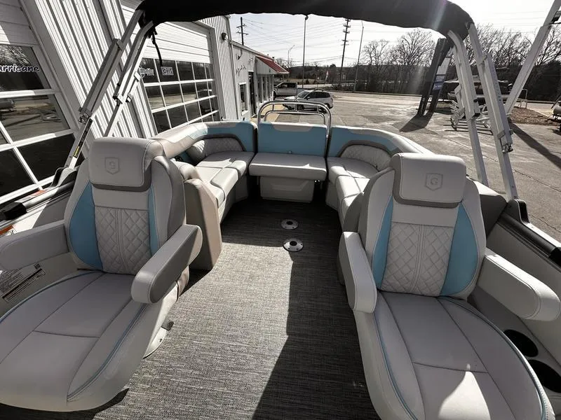 Slide: The Image of 2025 Godfrey Sweetwater 2286 SB pontoon boat interior with plush seating and modern design. - 7