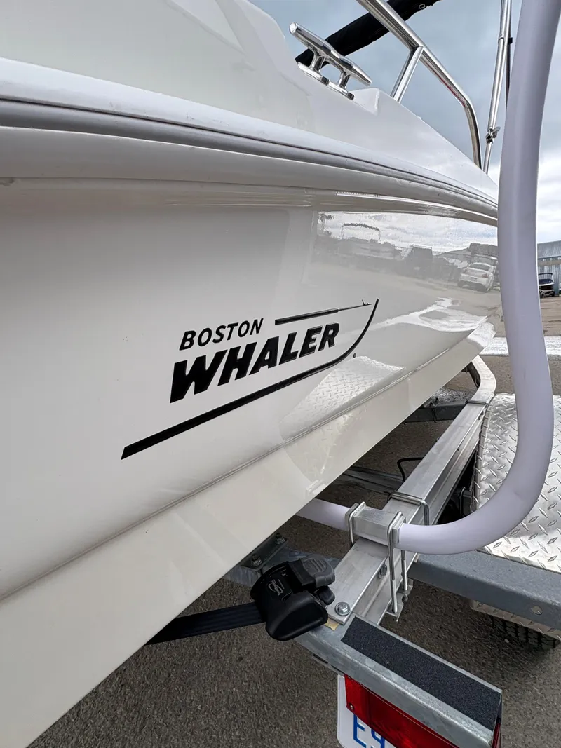 Slide: The Image of 2019 Boston Whaler 170 Dauntless boat on trailer, side view. - 3