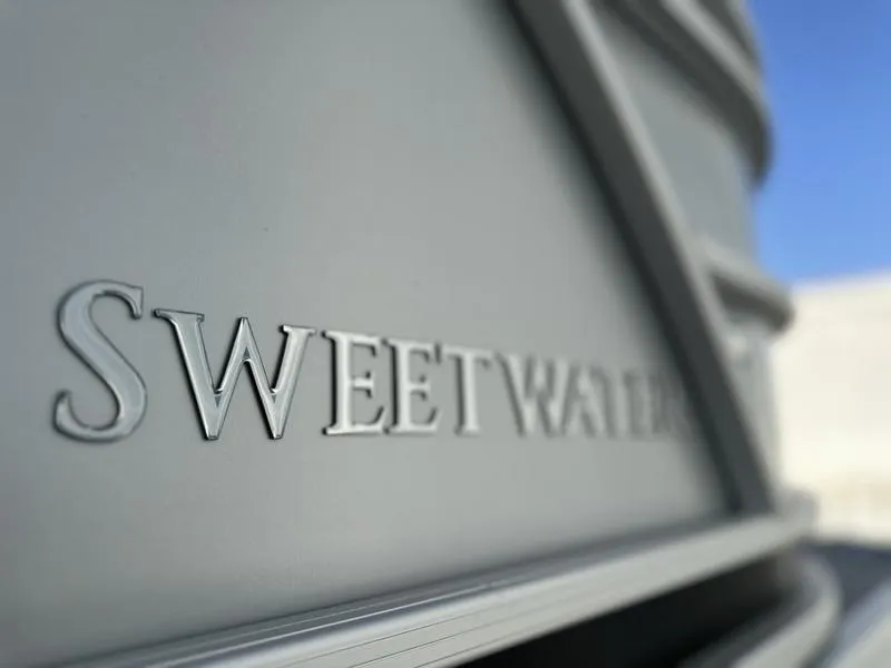Slide: The Image of 2025 Godfrey Sweetwater 2286 SFLC boat, close-up of embossed logo. - 15