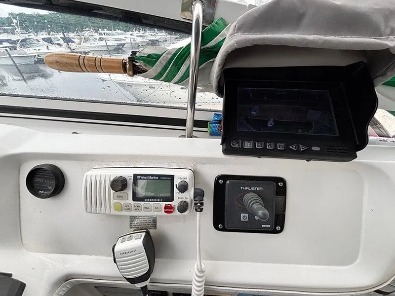 Slide: The Image of Helm of 2004 Cruisers Yachts 375 Motoryacht with navigation controls and equipment. - 40