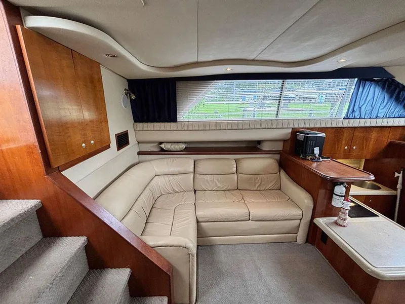 Slide: The Image of Luxurious interior of 2004 Cruisers Yachts 375 Motoryacht with beige leather seating. - 22