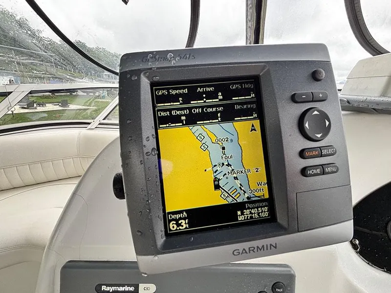 Slide: The Image of Garmin GPS display on 2004 Cruisers Yachts 375 Motoryacht, showing navigation map and depth. - 37