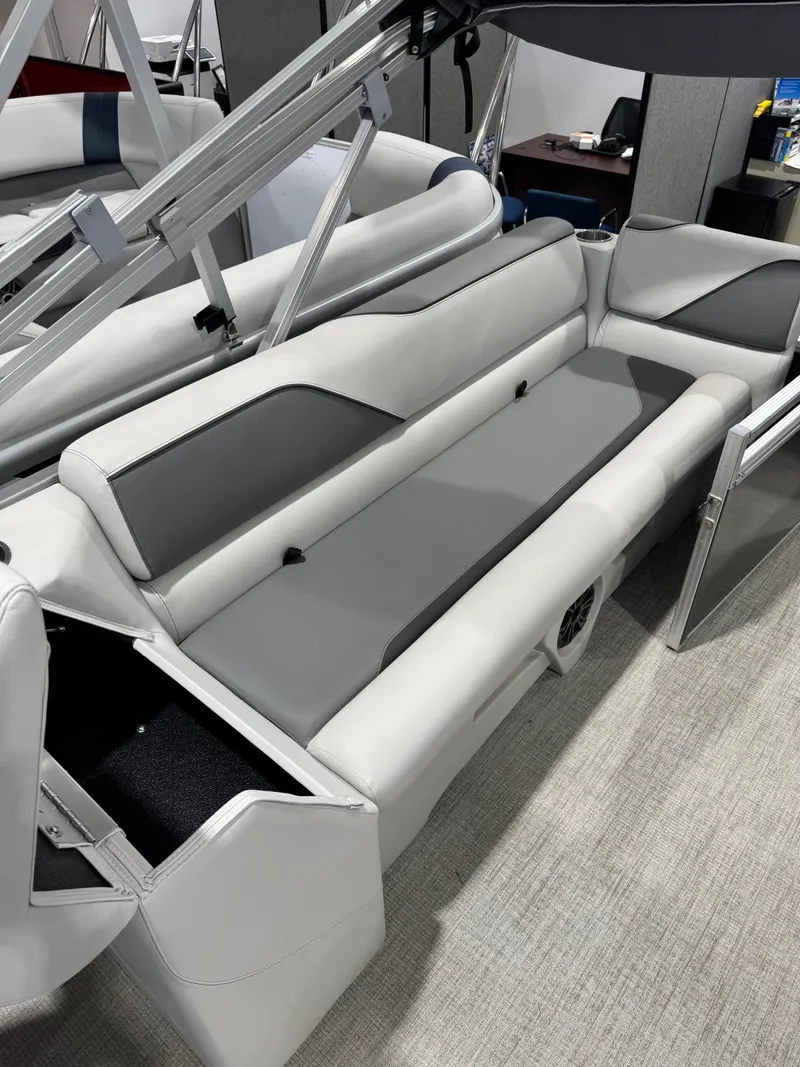 Slide: The Image of 2024 Avalon 2385 25 Venture 85 QL boat interior with sleek gray seating. - 10
