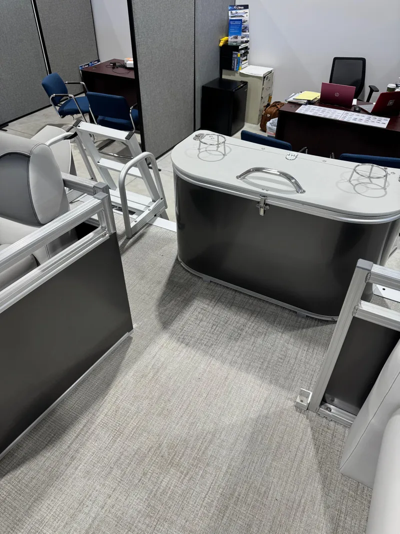 Slide: The Image of 2024 Avalon 2385 25 Venture 85 QL interior with seating and storage. - 11