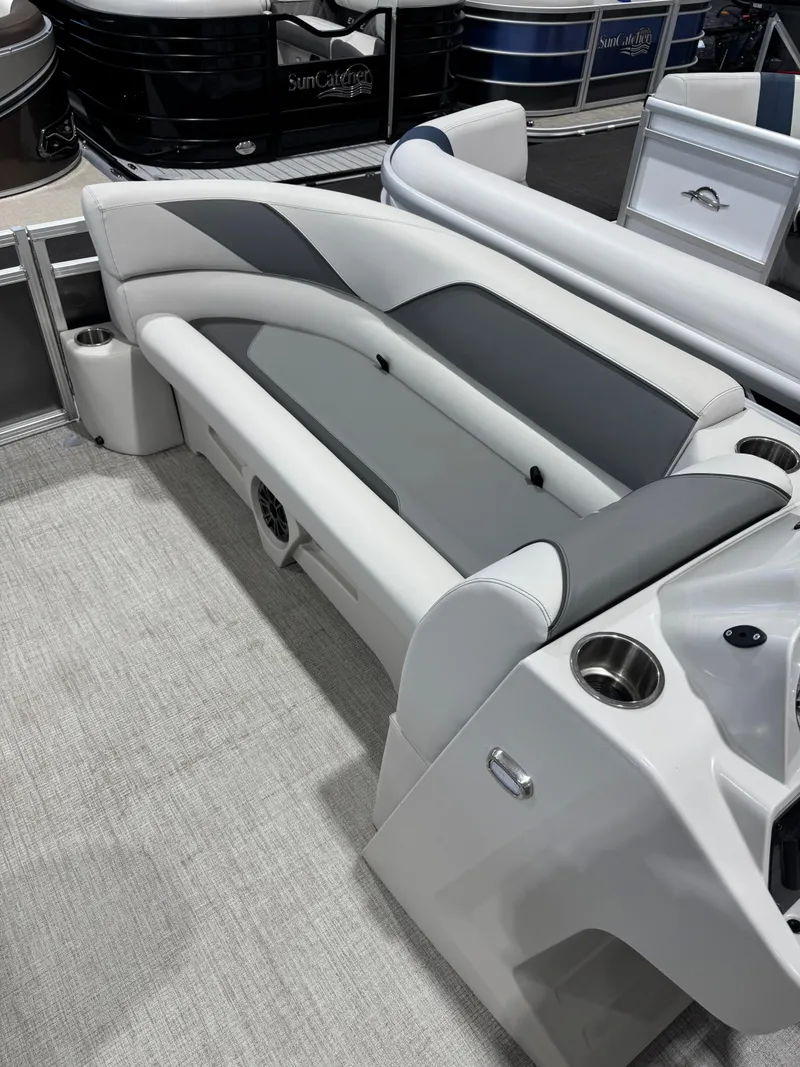 Slide: The Image of 2024 Avalon 2385 25 Venture 85 QL boat interior with sleek seating and cup holders. - 4