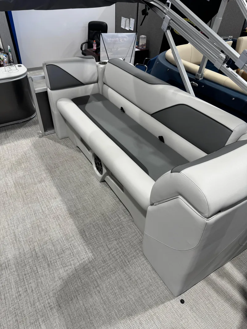 Slide: The Image of 2024 Avalon 2385 25 Venture 85 QL boat interior with sleek gray seating. - 8