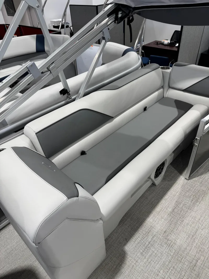 Slide: The Image of 2024 Avalon 2385 25 Venture 85 QL pontoon boat interior with gray and white seating. - 9
