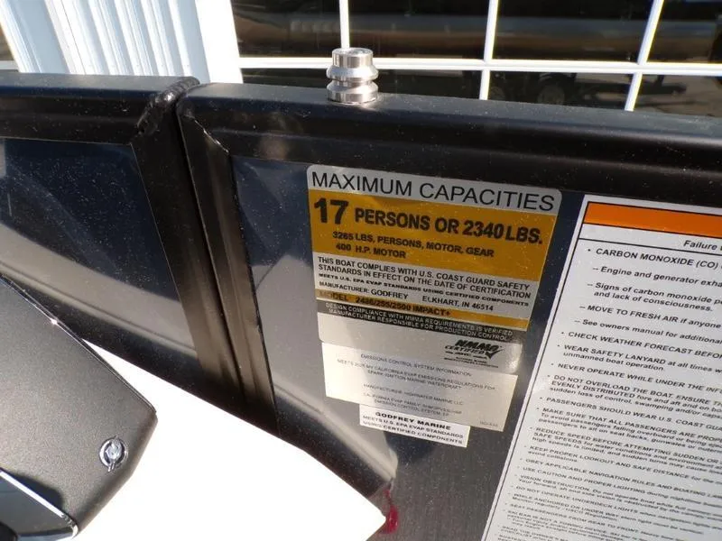 Slide: The Image of Maximum capacity label on 2025 Godfrey Sweetwater 2486 QS iMPACT boat, 17 persons or 2340 lbs. - 14