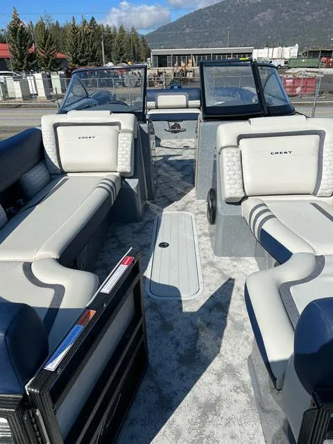 Slide: The Image of 2023 Crest Continental 250 boat interior with luxurious seating and modern design. - 11