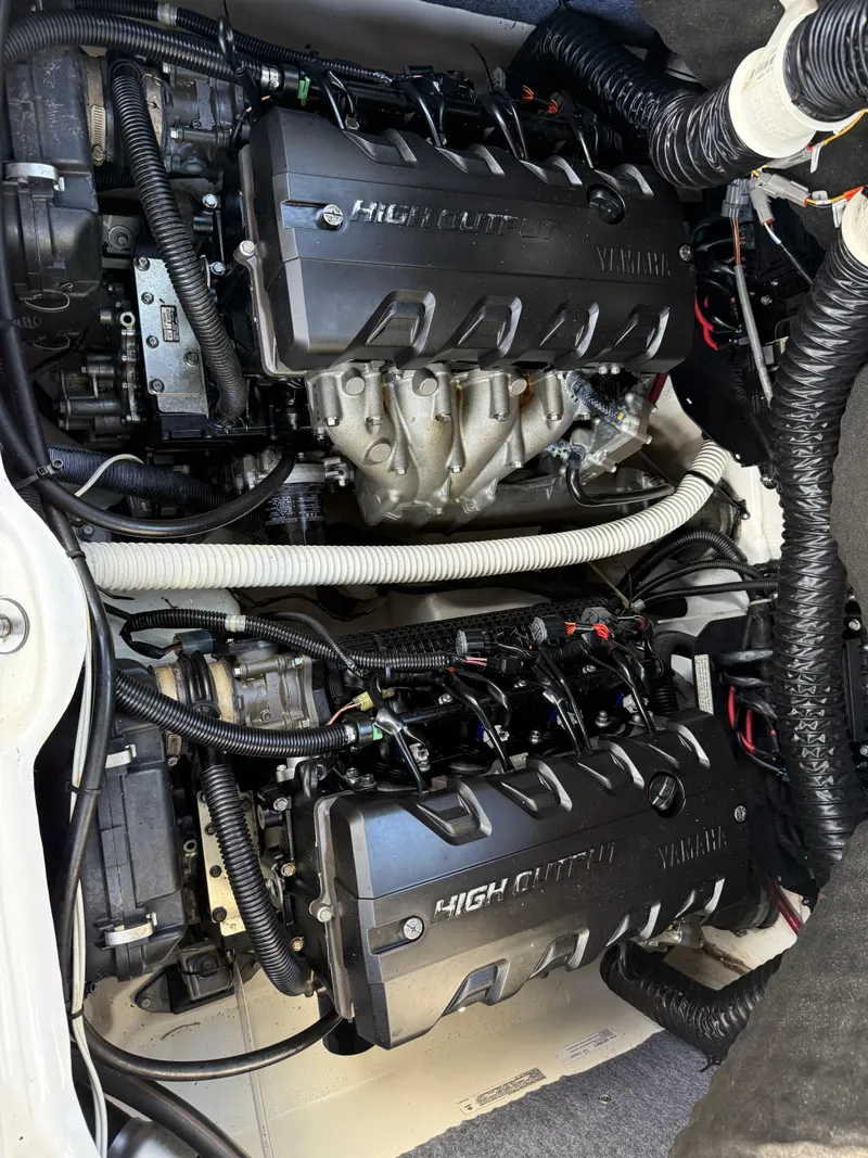Slide: The Image of Twin engines of a 2018 Yamaha Boats 242 Limited S E-Series, showcasing high output performance. - 12