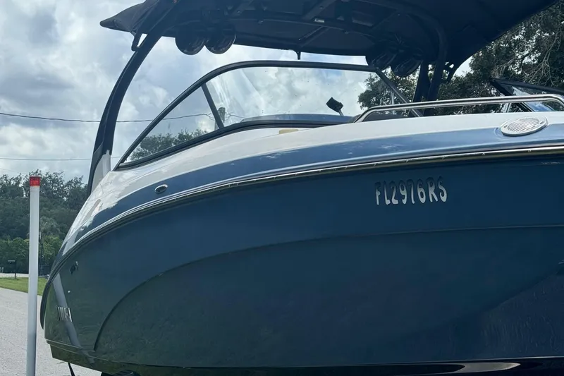 Slide: The Image of 2018 Yamaha Boats 242 Limited S E-Series on a sunny day, showcasing sleek design. - 7